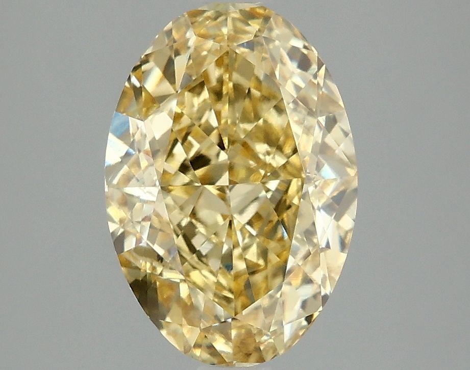 Loose Diamond - OVAL 3.07ct Fancy Vivid Yellow VS1: Loose Diamond - OVAL 3.07ct Fancy Vivid Yellow VS1 Source: This is a real non-mined Diamond that has been grown in a lab Shape: OVAL Carats: 3.07 Color: Fancy Vivid Yellow Certification: IGI Video: