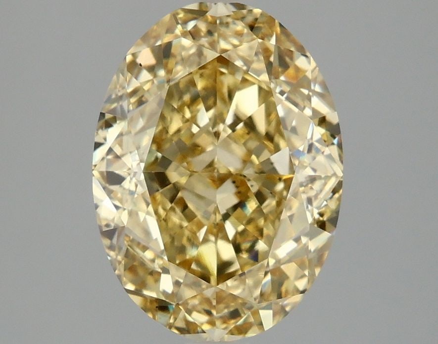 Loose Diamond - OVAL 3.06ct Fancy Intense Yellow VS2: Loose Diamond - OVAL 3.06ct Fancy Intense Yellow VS2 Source: This is a real non-mined Diamond that has been grown in a lab Shape: OVAL Carats: 3.06 Color: Fancy Intense Yellow Certification: IGI Video