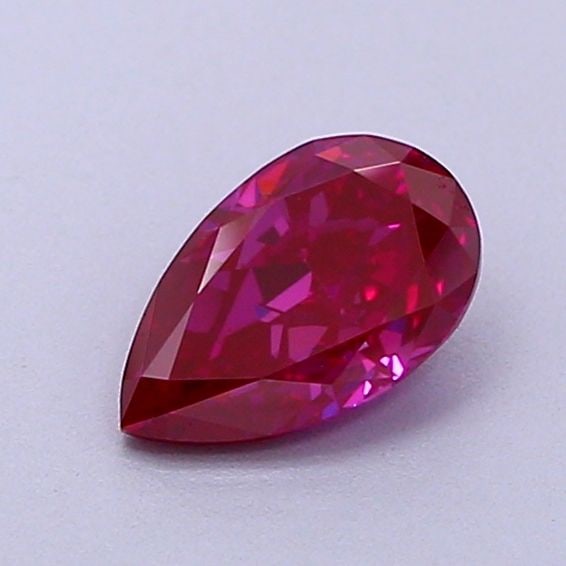 Loose Diamond - PEAR 0.68ct Fancy Vivid Purple Pink VS2: Loose Diamond - PEAR 0.68ct Fancy Vivid Purple Pink VS2 Source: This is a real non-mined Diamond that has been grown in a lab Shape: PEAR Carats: 0.68 Color: Fancy Vivid Purple Pink Certification: IGI