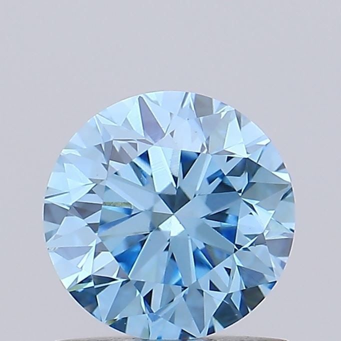 Loose Diamond - ROUND 0.92ct Fancy Vivid Blue VS1: Loose Diamond - ROUND 0.92ct Fancy Vivid Blue VS1 Source: This is a real non-mined Diamond that has been grown in a lab Shape: ROUND Carats: 0.92 Color: Fancy Vivid Blue Certification: IGI Video: