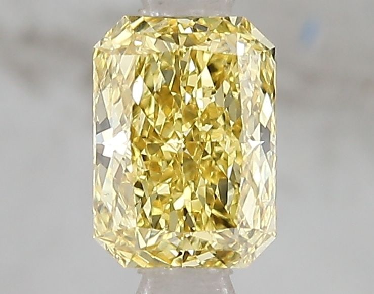 Loose Diamond - RADIANT 1.09ct Fancy Vivid Yellow VS2: Loose Diamond - RADIANT 1.09ct Fancy Vivid Yellow VS2 Source: This is a real non-mined Diamond that has been grown in a lab Shape: RADIANT Carats: 1.09 Color: Fancy Vivid Yellow Certification: IGI