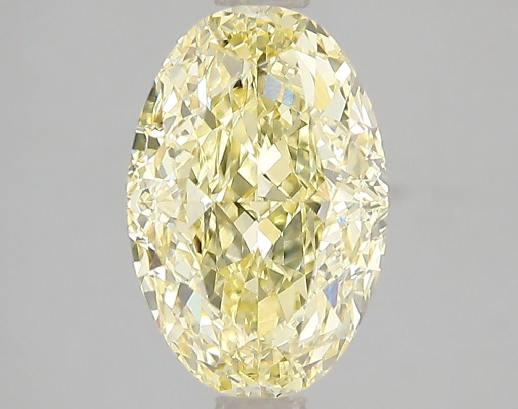 Loose Diamond - OVAL 3.11ct Fancy Vivid Yellow VS1: Loose Diamond - OVAL 3.11ct Fancy Vivid Yellow VS1 Source: This is a real non-mined Diamond that has been grown in a lab Shape: OVAL Carats: 3.11 Color: Fancy Vivid Yellow Certification: IGI Video: