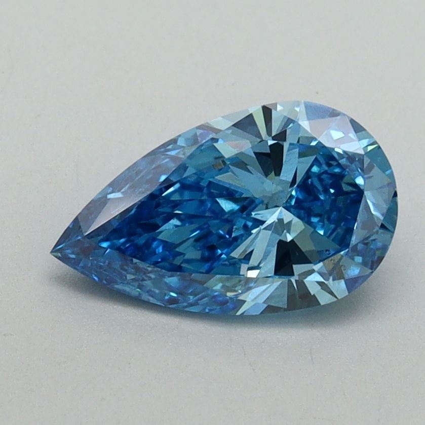 Loose Diamond - PEAR 1.0ct Fancy Vivid Blue VS2: Loose Diamond - PEAR 1.0ct Fancy Vivid Blue VS2 Source: This is a real non-mined Diamond that has been grown in a lab Shape: PEAR Carats: 1.0 Color: Fancy Vivid Blue Certification: IGI Video: