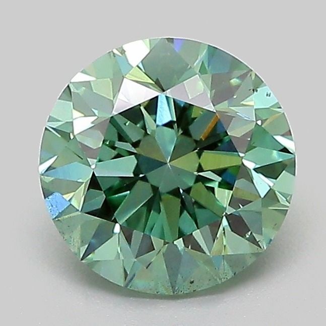 Loose Diamond - ROUND 1.51ct Fancy Vivid Green VS2: Loose Diamond - ROUND 1.51ct Fancy Vivid Green VS2 Source: This is a real non-mined Diamond that has been grown in a lab Shape: ROUND Carats: 1.51 Color: Fancy Vivid Green Certification: IGI Video: