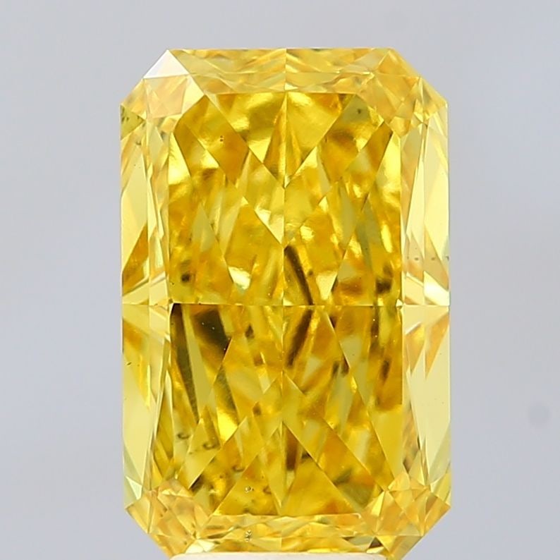 Loose Diamond - RADIANT 5.17ct Fancy Vivid Yellow VS2: Loose Diamond - RADIANT 5.17ct Fancy Vivid Yellow VS2 Source: This is a real non-mined Diamond that has been grown in a lab Shape: RADIANT Carats: 5.17 Color: Fancy Vivid Yellow Certification: IGI Vid