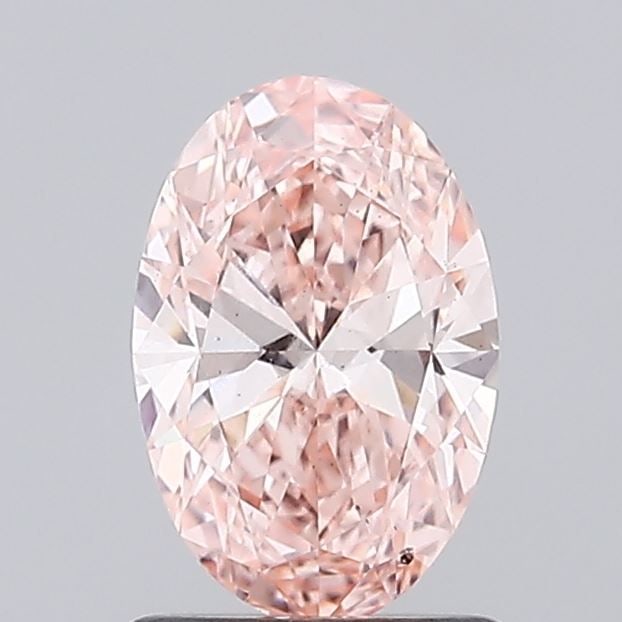 Loose Diamond - OVAL 1.01ct Fancy Vivid Pink SI1: Loose Diamond - OVAL 1.01ct Fancy Vivid Pink SI1 Source: This is a real non-mined Diamond that has been grown in a lab Shape: OVAL Carats: 1.01 Color: Fancy Vivid Pink Certification: IGI Video:
