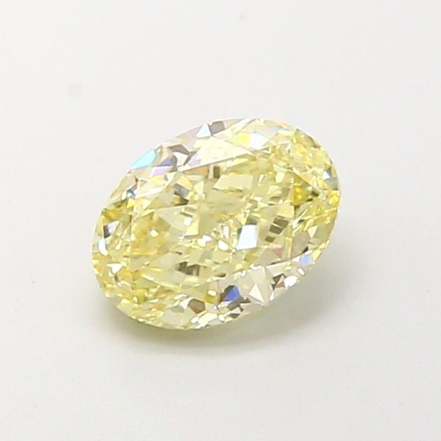 Loose Diamond - OVAL 1.1ct Fancy Light Yellow VVS2: Loose Diamond - OVAL 1.1ct Fancy Light Yellow VVS2 Source: This is a real non-mined Diamond that has been grown in a lab Shape: OVAL Carats: 1.1 Color: Fancy Light Yellow Certification: IGI Video: