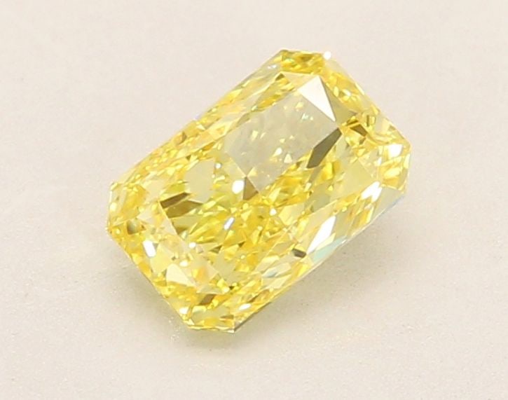 Loose Diamond - RADIANT 1.04ct Fancy Vivid Yellow VVS2: Loose Diamond - RADIANT 1.04ct Fancy Vivid Yellow VVS2 Source: This is a real non-mined Diamond that has been grown in a lab Shape: RADIANT Carats: 1.04 Color: Fancy Vivid Yellow Certification: IGI Vi