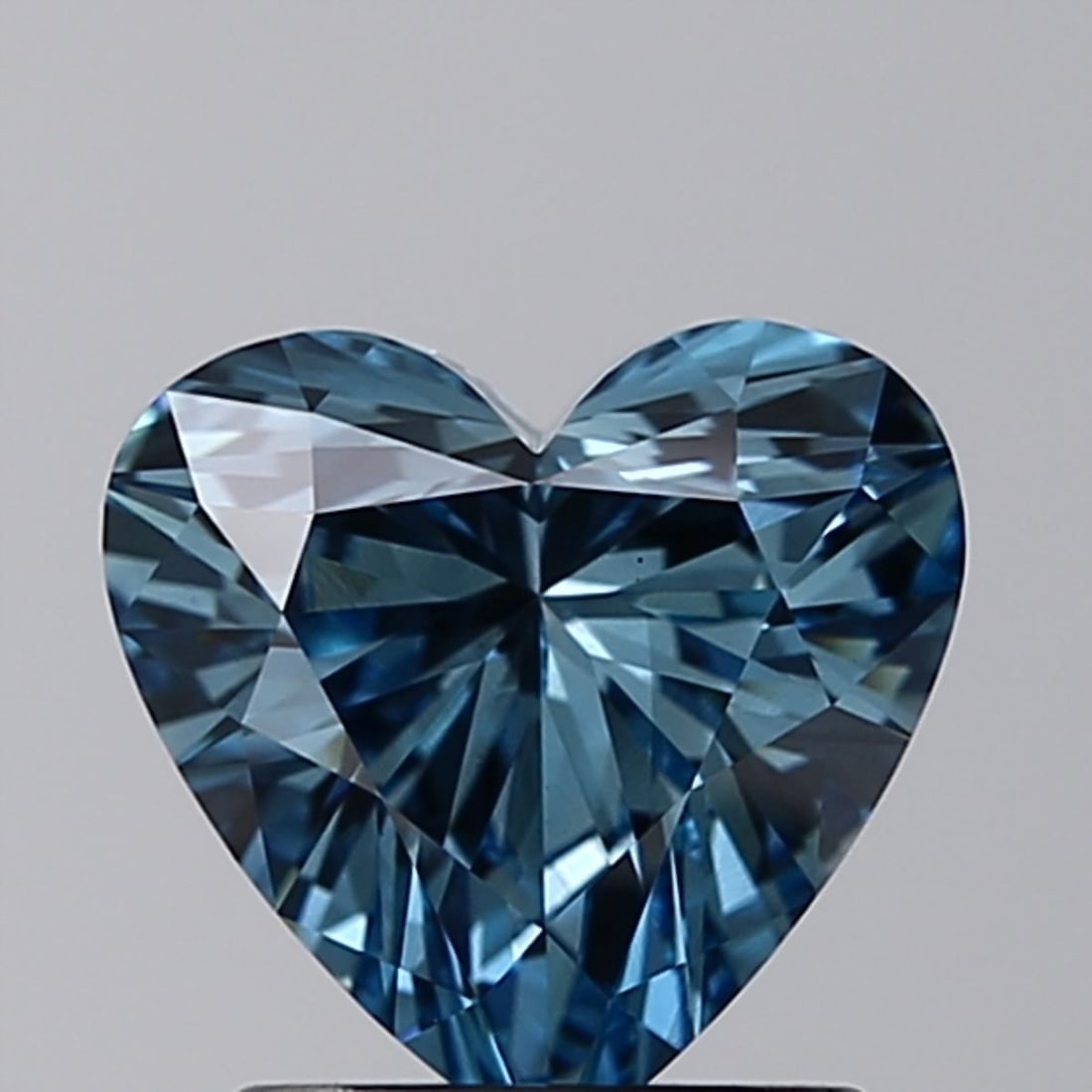 Loose Diamond - HEART 1.23ct Fancy Vivid Blue VS2: Loose Diamond - HEART 1.23ct Fancy Vivid Blue VS2 Source: This is a real non-mined Diamond that has been grown in a lab Shape: HEART Carats: 1.23 Color: Fancy Vivid Blue Certification: IGI Video: