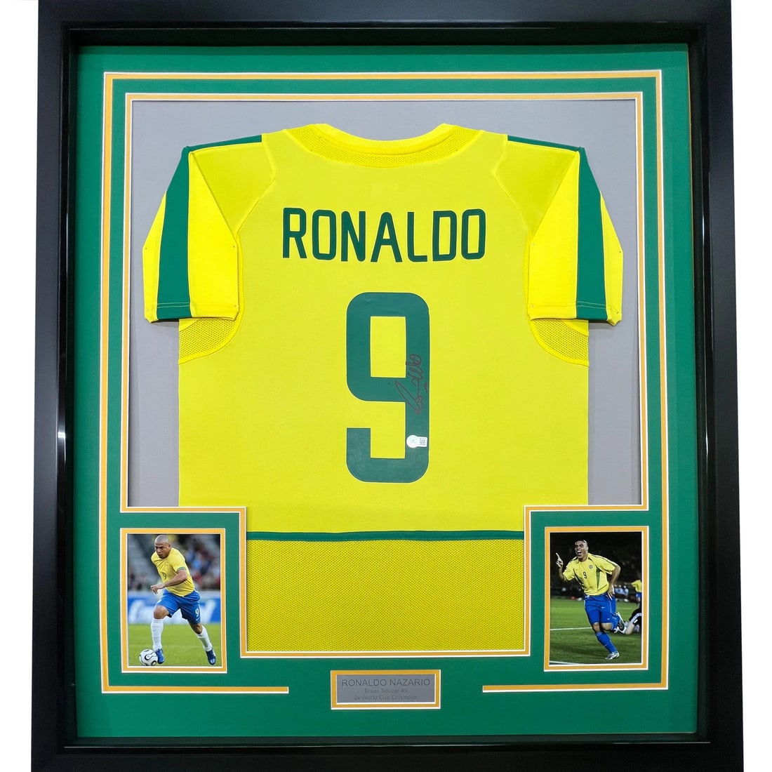 Framed Autographed Ronaldo Nazario Brazil Jersey with BAS COA 33x42: Framed Autographed Ronaldo Nazario Brazil Jersey with BAS COA 33x42 Showcase your passion for soccer with this stunning framed autographed Ronaldo Nazario Brazil yellow jersey. This original jersey, a