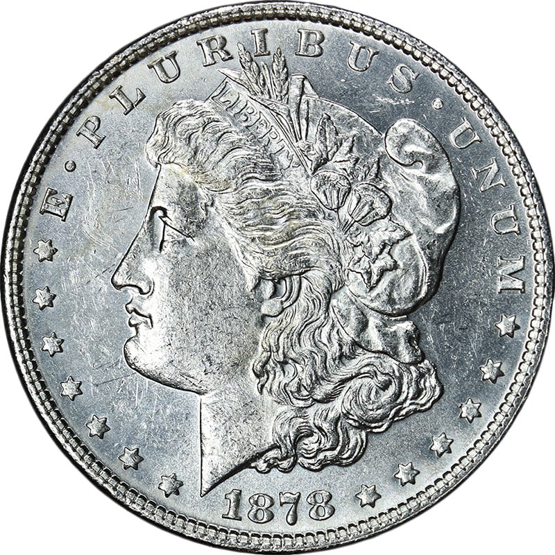 Uncirculated 1878 Morgan Dollar 7 Tail Feathers Philadelphia Mint Silver BU: Uncirculated 1878 Morgan Dollar 7 Tail Feathers Philadelphia Mint Silver BU This 1878-P 7 Tail Feathers Morgan Silver Dollar is uncirculated and features a brilliant, blast white appearance with excep