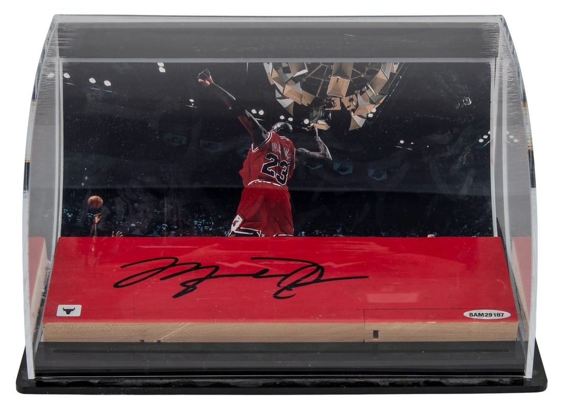 Michael Jordan Signed Game Used Bulls Floor Display with UDA Beckett COA: Michael Jordan Signed Game Used Bulls Floor Display with UDA Beckett COA Presenting a remarkable piece of basketball history, this game-used Chicago Bulls floor display is signed by the legendary Mich