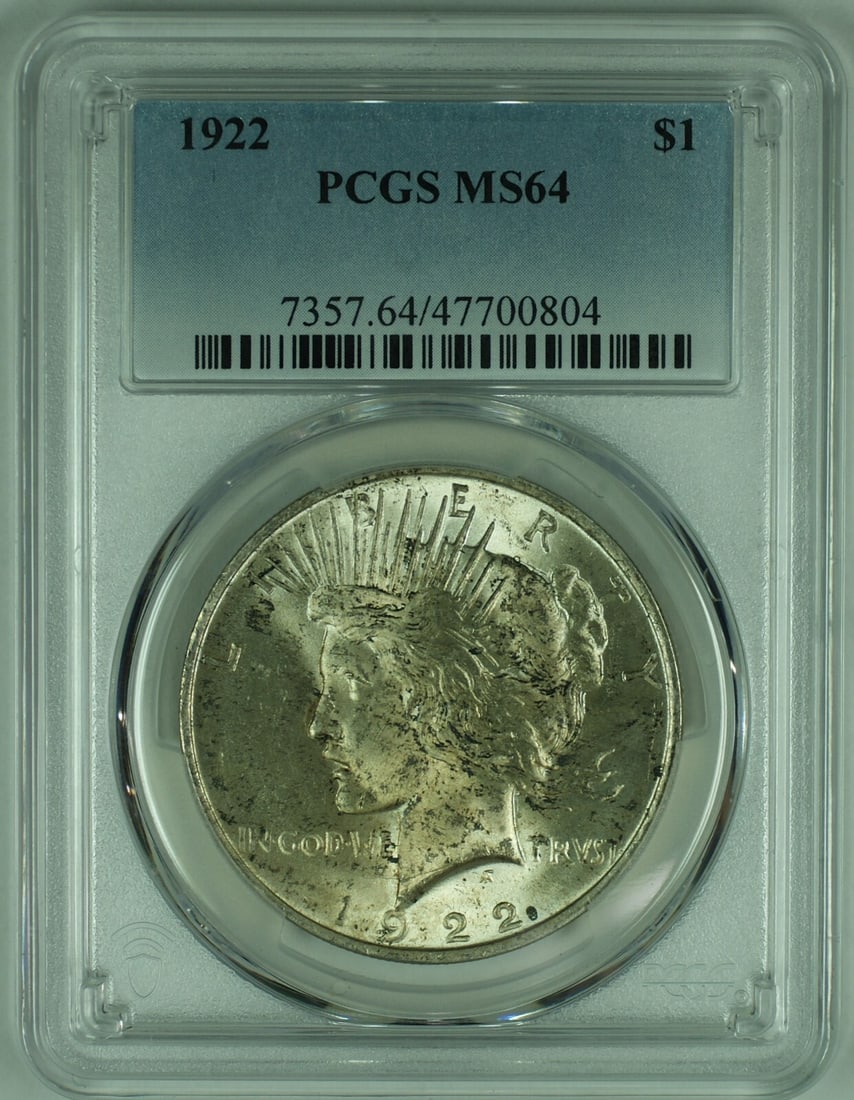 PCGS MS 64 1922 Peace Silver Dollar Coin Toned Uncirculated: PCGS MS 64 1922 Peace Silver Dollar Coin Toned Uncirculated This 1922 Peace Silver Dollar features attractive toning and is graded MS 64 by PCGS. Uncirculated and composed of silver, it originates fro