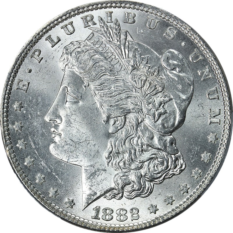 1882-P Morgan Silver Dollar PCGS MS64 Uncirculated Blast White: 1882-P Morgan Silver Dollar PCGS MS64 Uncirculated Blast White This stunning 1882-P Morgan Silver Dollar is certified by PCGS with a grade of MS64, showcasing exceptional blast white luster and a stro