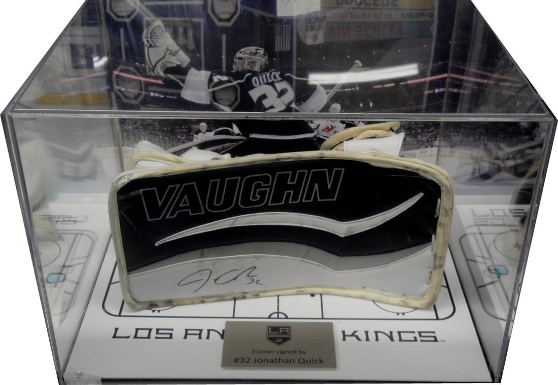 Jonathan Quick Autographed Game Used Vaughn Blocker Los Angeles Kings Framed: Jonathan Quick Autographed Game Used Vaughn Blocker Los Angeles Kings Framed This is a game-used Vaughn blocker signed by NHL goaltender Jonathan Quick, a key player for the Los Angeles Kings. The blo