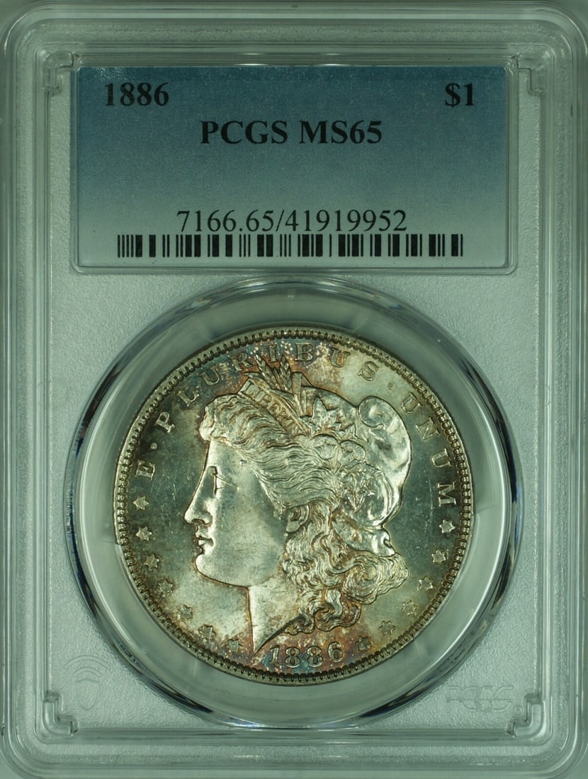 PCGS MS-65 1886 Morgan Silver Dollar Toned Philadelphia Mint: PCGS MS-65 1886 Morgan Silver Dollar Toned Philadelphia Mint This 1886 Morgan Silver Dollar is graded MS-65 by PCGS and features attractive toning. Minted in Philadelphia, this uncirculated coin is co