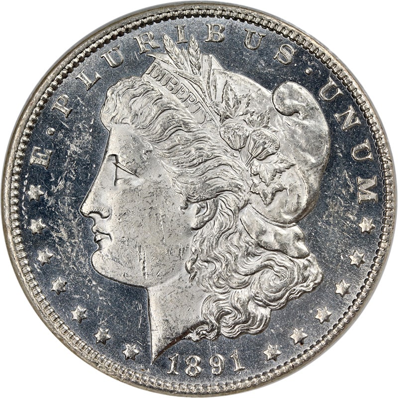Uncirculated 1891-CC Morgan Dollar BU DMPL Blast White with Strong Strike: Uncirculated 1891-CC Morgan Dollar BU DMPL Blast White with Strong Strike The 1891-CC Morgan Silver Dollar is an uncirculated coin featuring a strong strike, blast white surfaces, and deep mirror proo