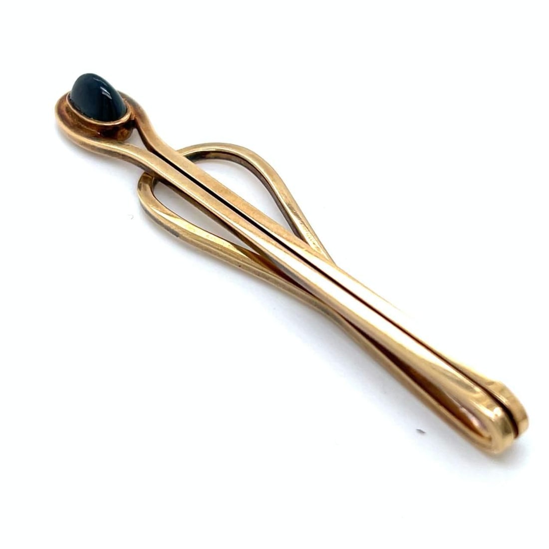 1960's TIFFANY & CO. 14K Yellow Gold Sapphire Money Clip 2.00 Ct: 1960's TIFFANY & CO. 14K Yellow Gold Sapphire Money Clip 2.00 Ct This exquisite 1960's Tiffany & Co. money clip is crafted from 14K yellow gold and features a stunning sapphire. Weighing approximately