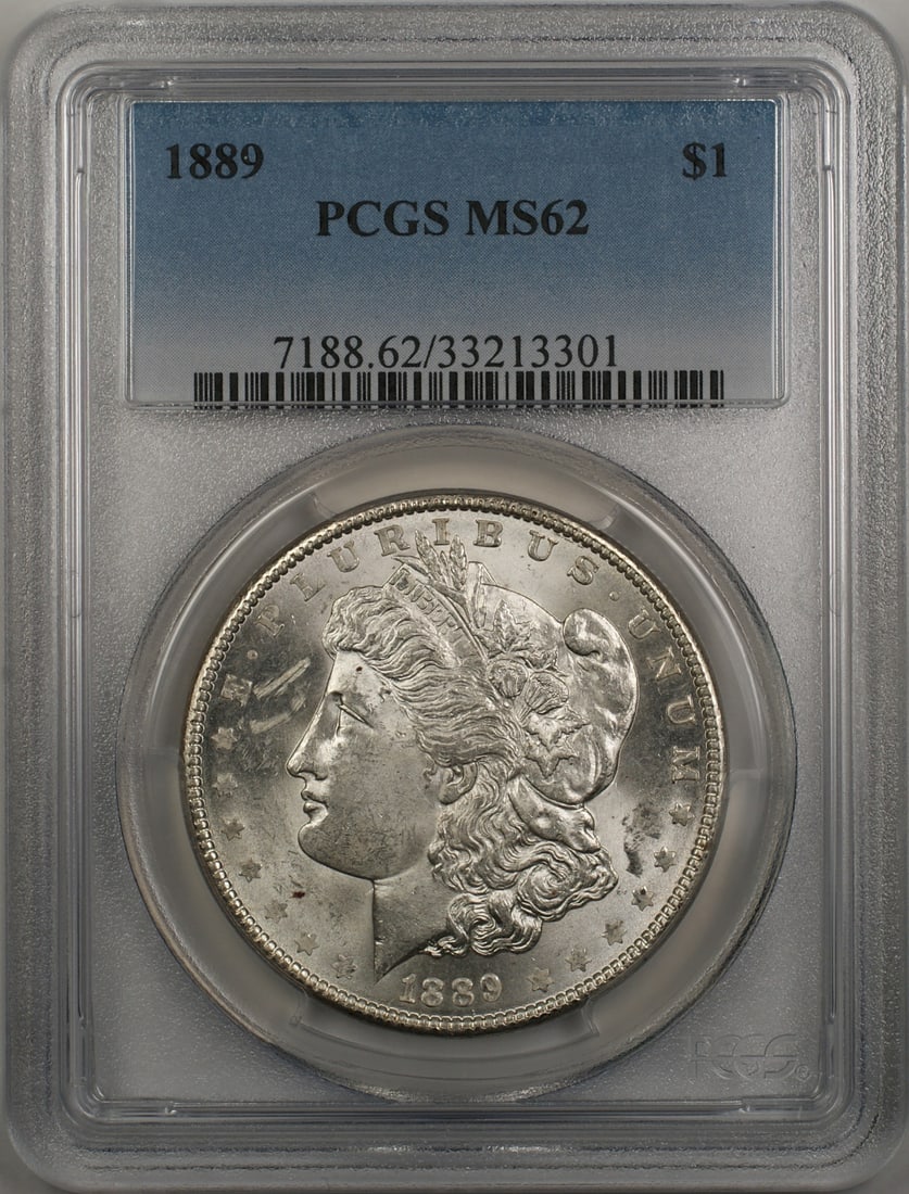 PCGS MS62 1889 Morgan Dollar Silver Coin from Philadelphia Mint: PCGS MS62 1889 Morgan Dollar Silver Coin from Philadelphia Mint This 1889 Morgan Silver Dollar is a United States coin minted in Philadelphia. Certified by PCGS with a grade of MS 62, it is composed o