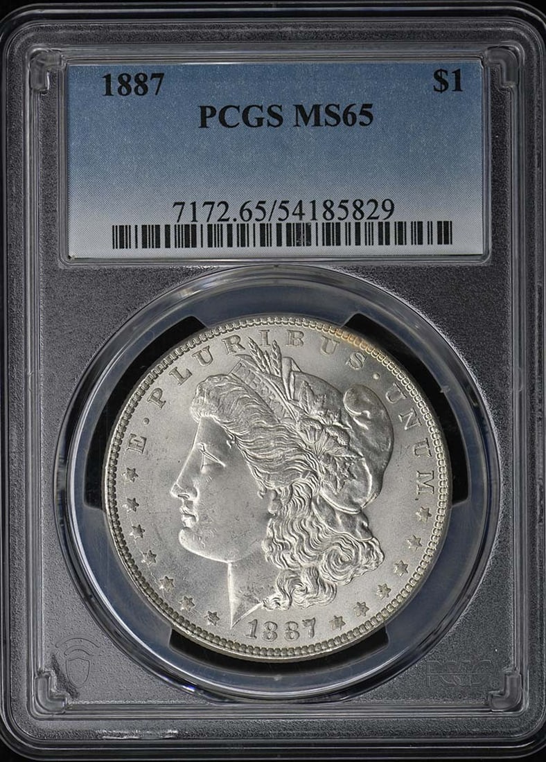 PCGS MS65 Graded 1887 Morgan Silver Dollar Coin: PCGS MS65 Graded 1887 Morgan Silver Dollar Coin This 1887 Morgan Dollar is graded MS65 and certified by PCGS. Minted in Philadelphia, it is an uncirculated coin in pre-owned condition. Specifications
