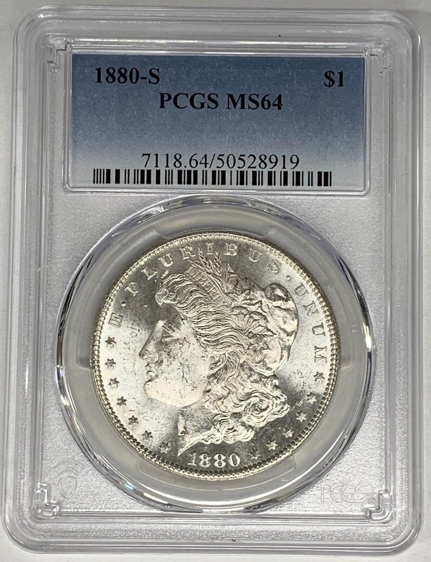 PCGS MS 64 Graded 1880-S Morgan Silver Dollar Uncirculated $1 Coin: PCGS MS 64 Graded 1880-S Morgan Silver Dollar Uncirculated $1 Coin This is an 1880-S Morgan Silver Dollar graded MS 64 by PCGS. The coin is uncirculated and features a silver composition. It is a pre-