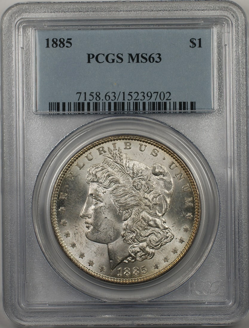 PCGS MS 63 1885 Morgan Dollar Silver Coin from Philadelphia: PCGS MS 63 1885 Morgan Dollar Silver Coin from Philadelphia This is an 1885 Morgan Silver Dollar coin from the United States, graded MS 63 by PCGS. The coin is uncirculated and was minted in Philadelp