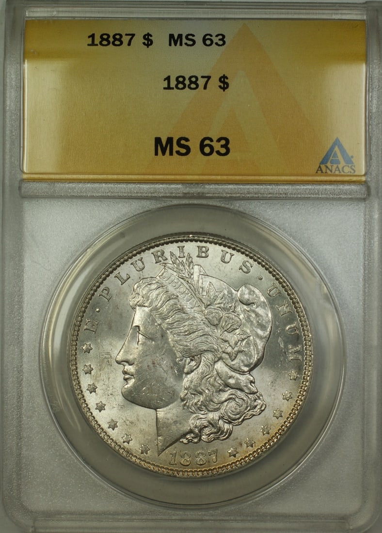 ANACS MS 63 1887 Toned Morgan Dollar $1 Silver Coin: ANACS MS 63 1887 Toned Morgan Dollar $1 Silver Coin This 1887 Morgan Silver Dollar is an uncirculated $1 coin from the United States, minted in Philadelphia. It has been graded MS 63 by ANACS and feat