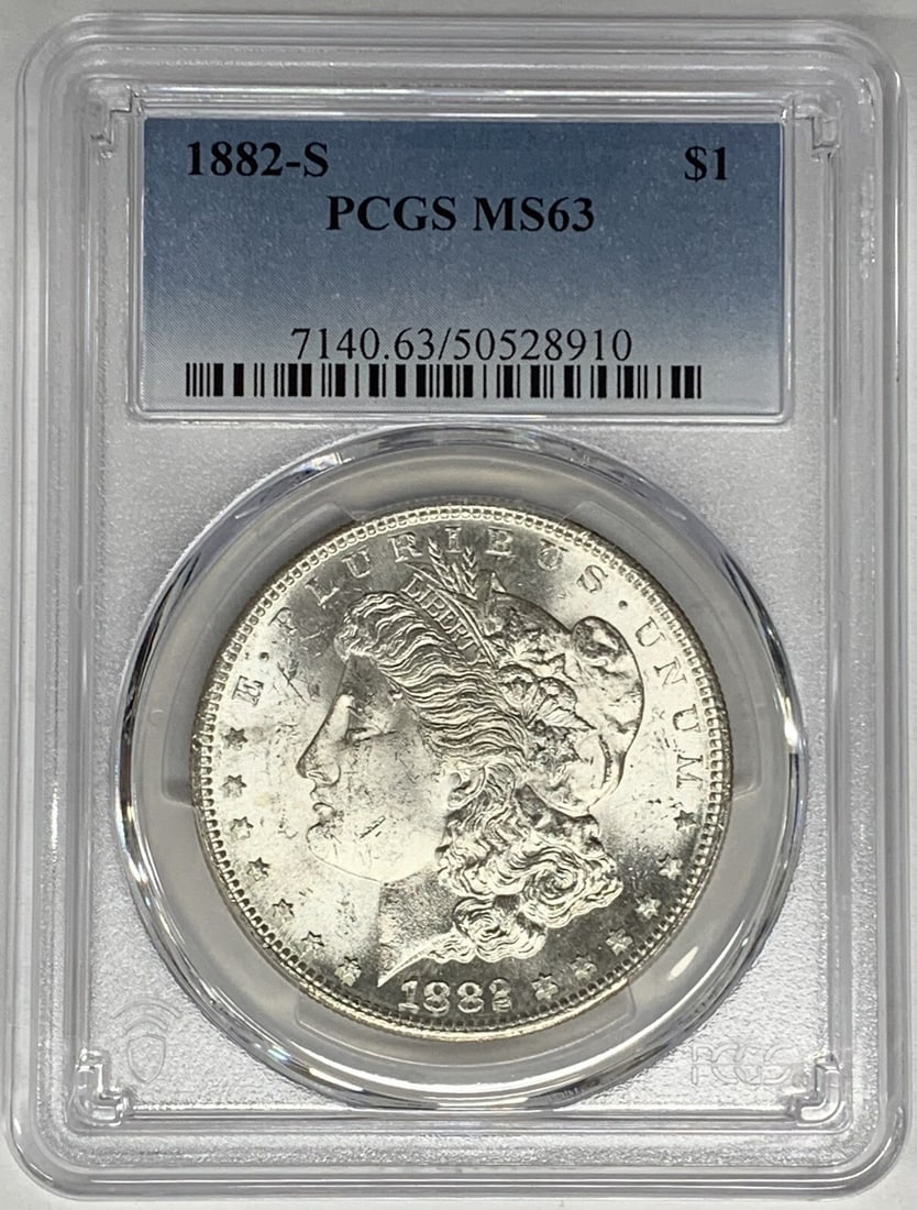 PCGS MS 63 1882-S Silver Morgan Dollar Certified Uncirculated Coin: PCGS MS 63 1882-S Silver Morgan Dollar Certified Uncirculated Coin This is an 1882-S Morgan Silver Dollar graded MS 63 by PCGS. The coin is uncirculated and features a silver composition. It was minte
