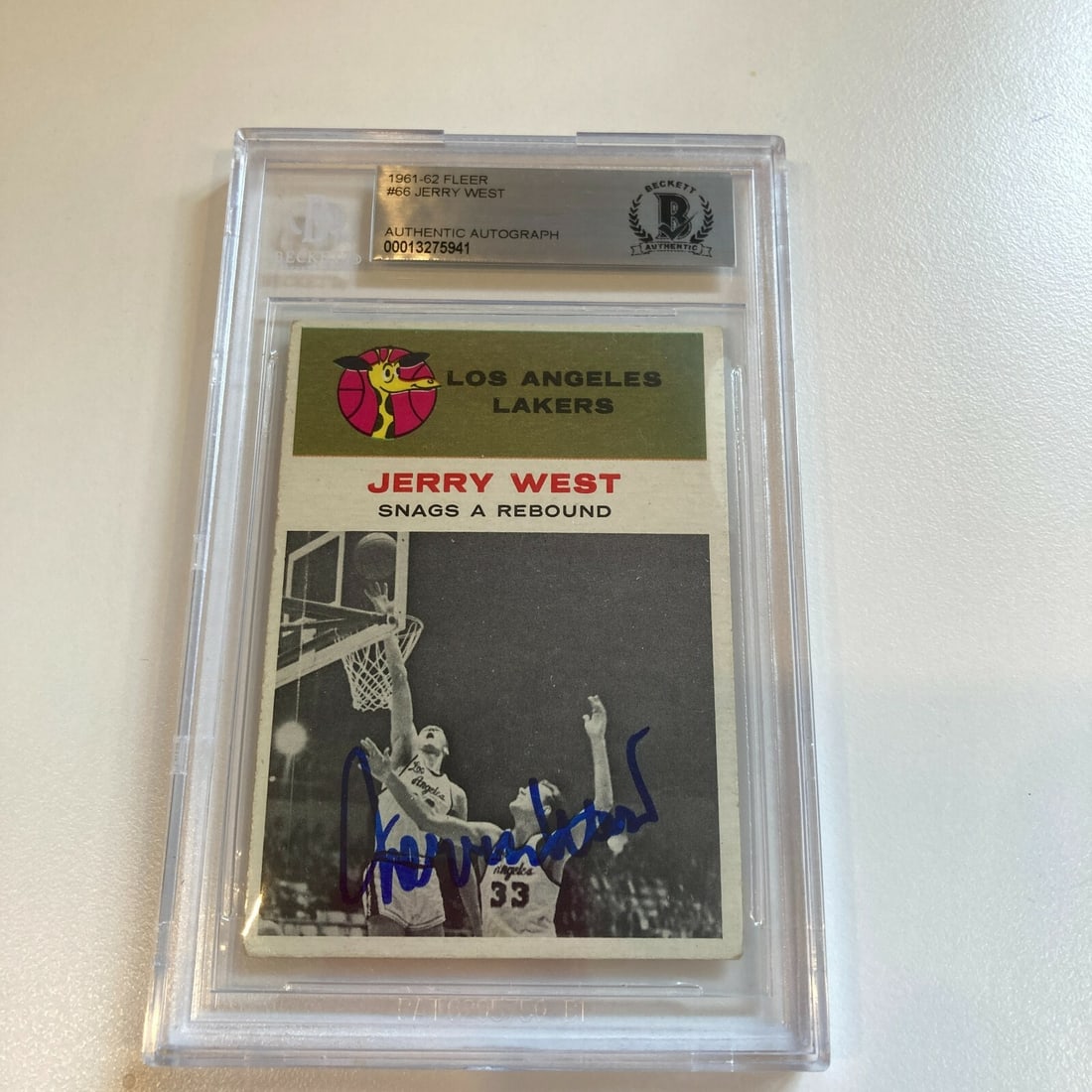 1961-62 Fleer Jerry West Rookie Autographed Card BGS Certified: 1961-62 Fleer Jerry West Rookie Autographed Card BGS Certified This 1961-62 Fleer Jerry West Signed Rookie RC Card is a must-have for any basketball memorabilia collector. Featuring the legendary Jerr