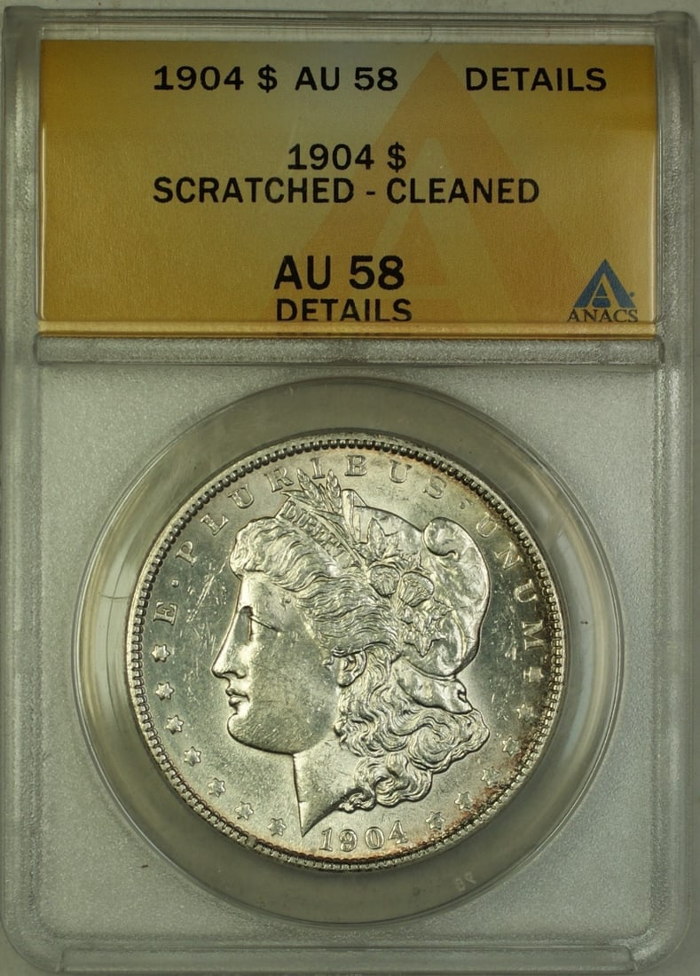 ANACS AU-58 Details 1904 Morgan Dollar Silver Coin Scratched and Cleaned: ANACS AU-58 Details 1904 Morgan Dollar Silver Coin Scratched and Cleaned This 1904 Morgan Silver Dollar is certified by ANACS with an AU-58 Details grade. The coin was minted in Philadelphia and featu