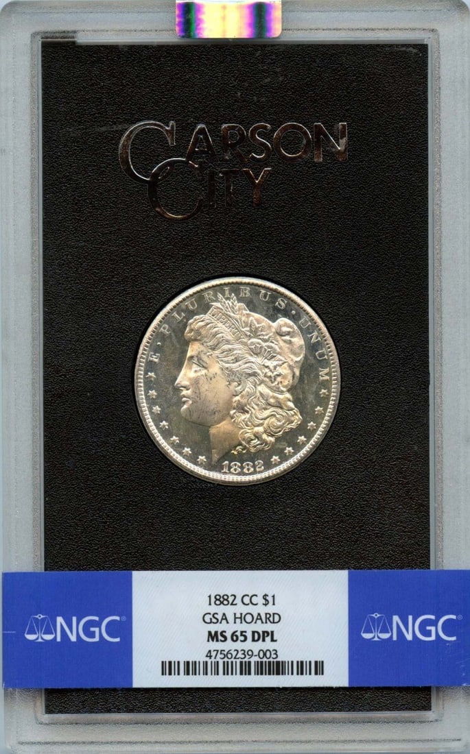 1882-CC Morgan Dollar GSA Hoard NGC MS65 DMPL Uncirculated: 1882-CC Morgan Dollar GSA Hoard NGC MS65 DMPL Uncirculated This stunning 1882-CC Morgan Dollar is a remarkable piece of numismatic history, struck at the Carson City Mint. Graded as MS65 by NGC, it sh