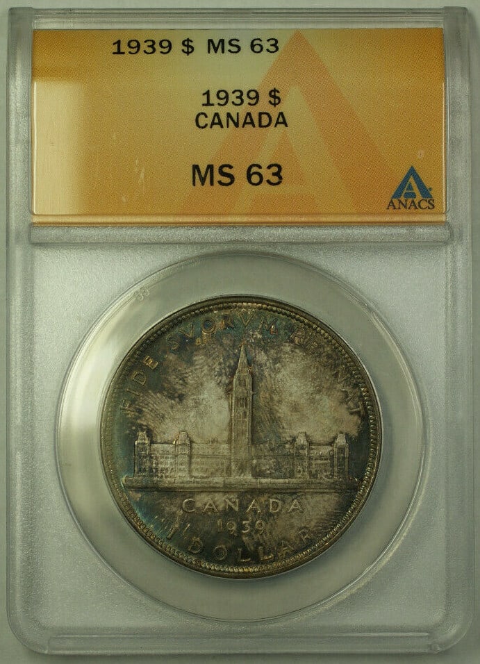 Canada 1939 Silver Dollar King George VI ANACS MS-63 Toned Coin: Canada 1939 Silver Dollar King George VI ANACS MS-63 Toned Coin This 1939 Canada $1 silver coin features King George VI and has been graded MS-63 by ANACS. The coin has a fineness of 0.8 and exhibits