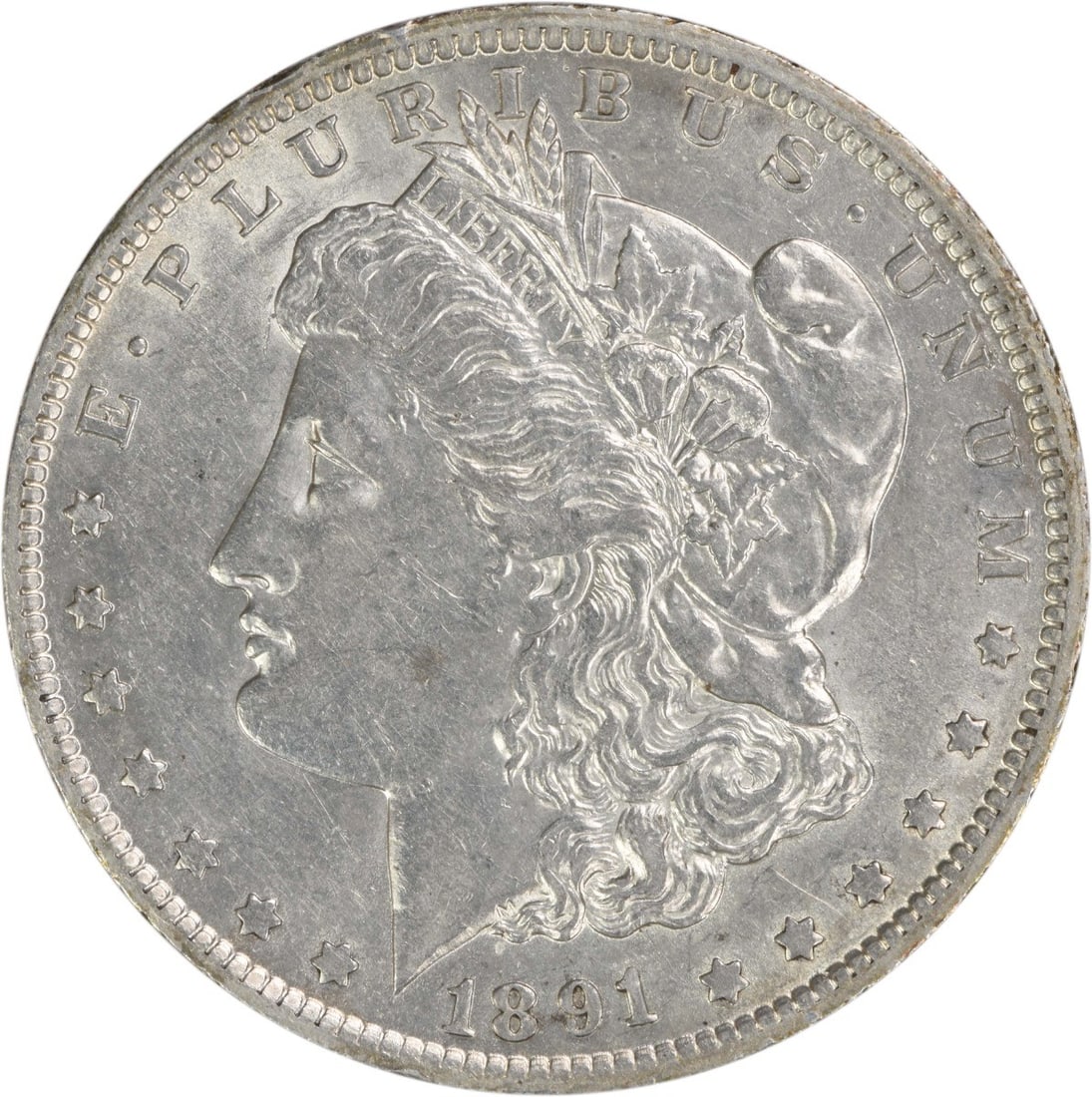 AU Grade 1891-O Morgan Dollar 90 Percent Silver Uncertified US Coin: AU Grade 1891-O Morgan Dollar 90 Percent Silver Uncertified US Coin This 1891-O Morgan Silver Dollar is an attractive example of this classic U.S. coin. Minted in New Orleans and designed by George T.