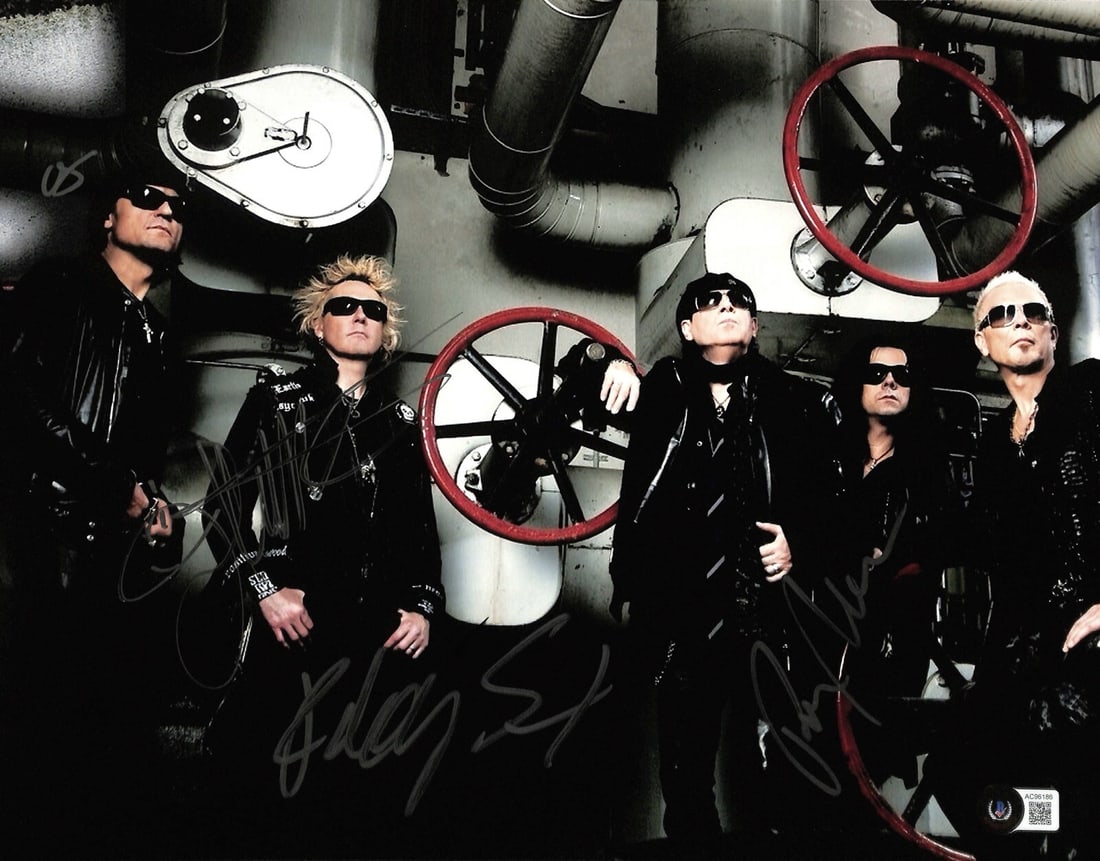 Scorpions Band Signed 11x14 Photo with Beckett LOA: Scorpions Band Signed 11x14 Photo with Beckett LOA This stunning 11x14 photograph features the signatures of legendary Scorpions band members Klaus Meine, Rudolf Schenker, and Matthias Jabs, all penne
