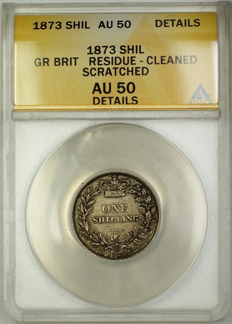 1873 United Kingdom Silver Shilling ANACS AU 50 Details Certified Coin: 1873 United Kingdom Silver Shilling ANACS AU 50 Details Certified Coin This is an 1873 Die 40 Britain shilling silver coin from the United Kingdom. Certified by ANACS with a grade of AU-50 Details, th
