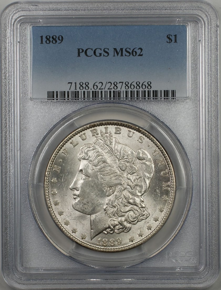 PCGS MS62 1889 Silver Morgan Dollar Coin from Philadelphia Mint: PCGS MS62 1889 Silver Morgan Dollar Coin from Philadelphia Mint This is an 1889 Morgan Silver Dollar $1 coin certified by PCGS with a grade of MS-62. The coin is uncirculated and was minted in Philade