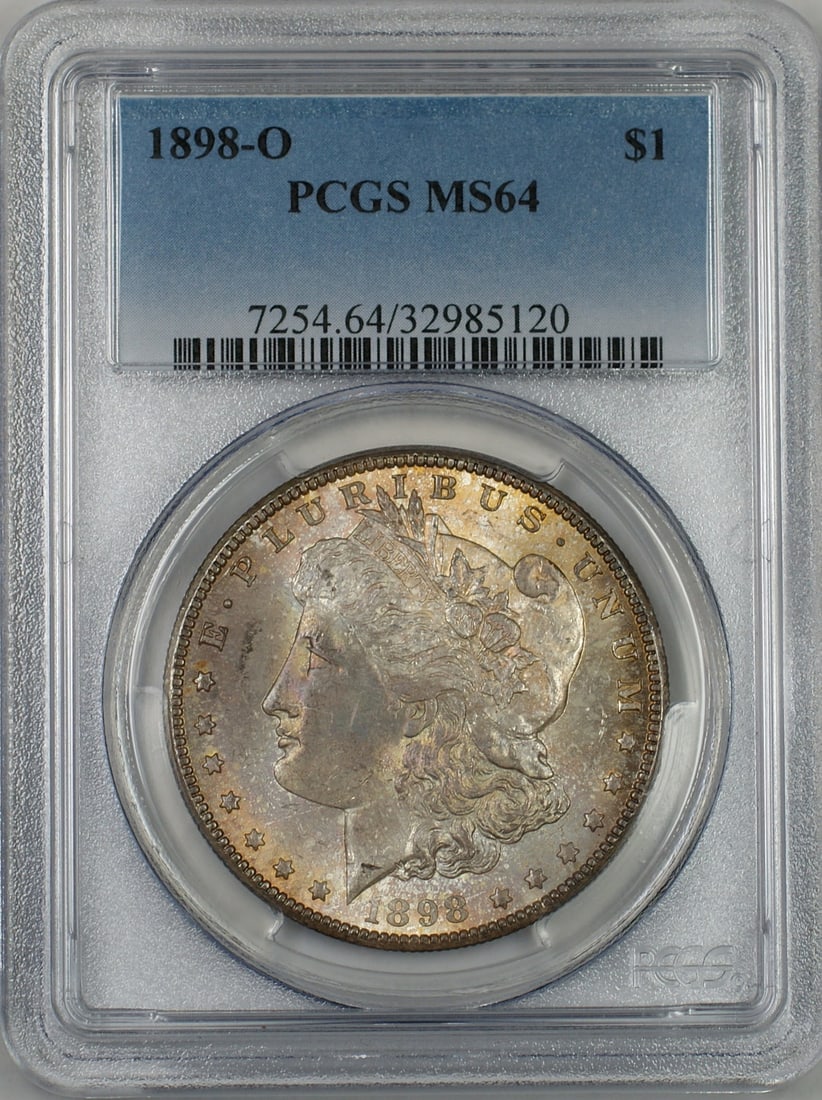 PCGS MS-64 1898-O Silver Morgan Dollar with Attractive Toning: PCGS MS-64 1898-O Silver Morgan Dollar with Attractive Toning This 1898-O Morgan Silver Dollar features attractive toning, especially on the reverse side. Certified by PCGS with a grade of MS 64, this