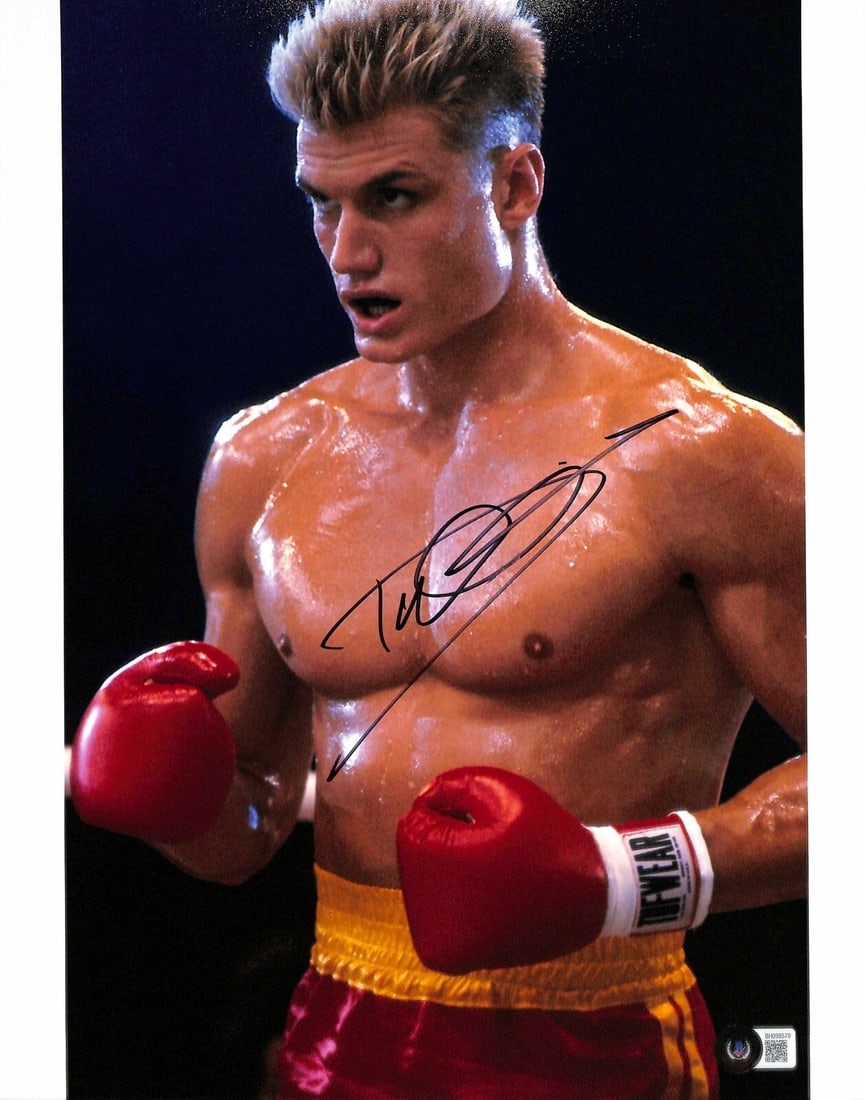 Signed 11x14 Dolph Lundgren Photo as Ivan Drago Rocky III Beckett Authenticated: Signed 11x14 Dolph Lundgren Photo as Ivan Drago Rocky III Beckett Authenticated This is an original 11x14 photograph signed by Dolph Lundgren, who portrayed Ivan Drago in the movie Rocky III. The auto
