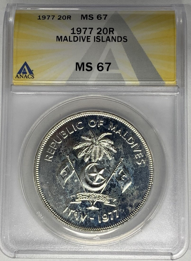 1977 Maldives 20 Rupee Coin ANACS Certified MS 67: 1977 Maldives 20 Rupee Coin ANACS Certified MS 67 This 1977 Maldive Island 20 Rupee coin is graded MS 67 and certified by ANACS. It is a pre-owned collectible from the Maldives, offering an appealing