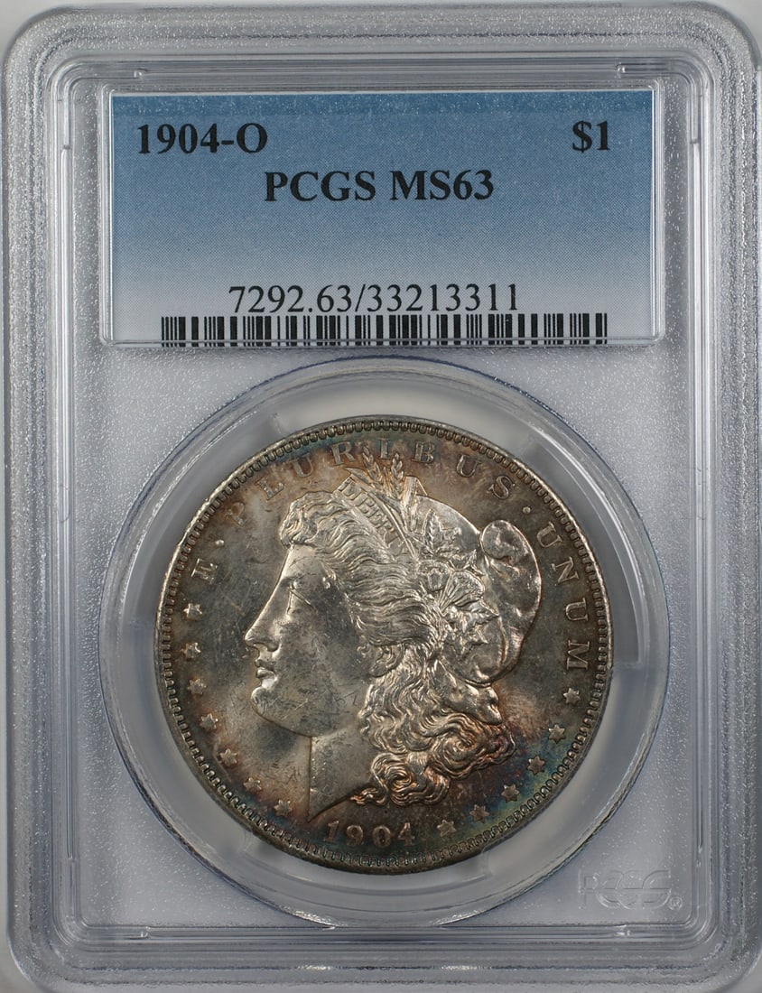 PCGS MS 63 1904-O Silver Dollar New Orleans Mint Toned: PCGS MS 63 1904-O Silver Dollar New Orleans Mint Toned This 1904-O Morgan Silver Dollar is a $1 coin minted in New Orleans and graded MS 63 by PCGS. It is composed of silver, features a toned appearan