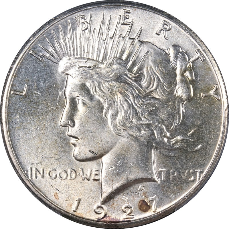 1927-P Peace Dollar PCGS MS64 Strong Eye Appeal Silver Coin: 1927-P Peace Dollar PCGS MS64 Strong Eye Appeal Silver Coin This 1927-P Peace Dollar, certified by PCGS as MS64, showcases exceptional eye appeal with a brilliant luster and a strong strike. The coin