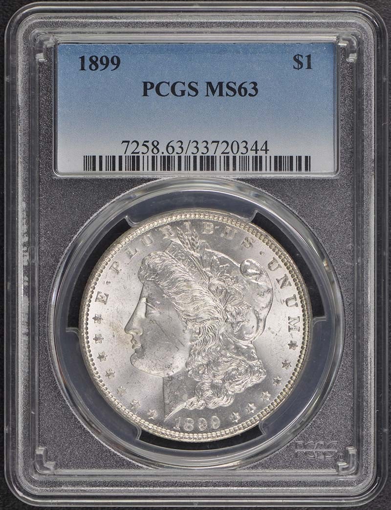 1899 Morgan Dollar PCGS MS63 Uncirculated Coin Philadelphia: 1899 Morgan Dollar PCGS MS63 Uncirculated Coin Philadelphia This stunning 1899 $1 Morgan Dollar is certified by PCGS with a grade of MS63, indicating its uncirculated condition. Struck at the Philadel