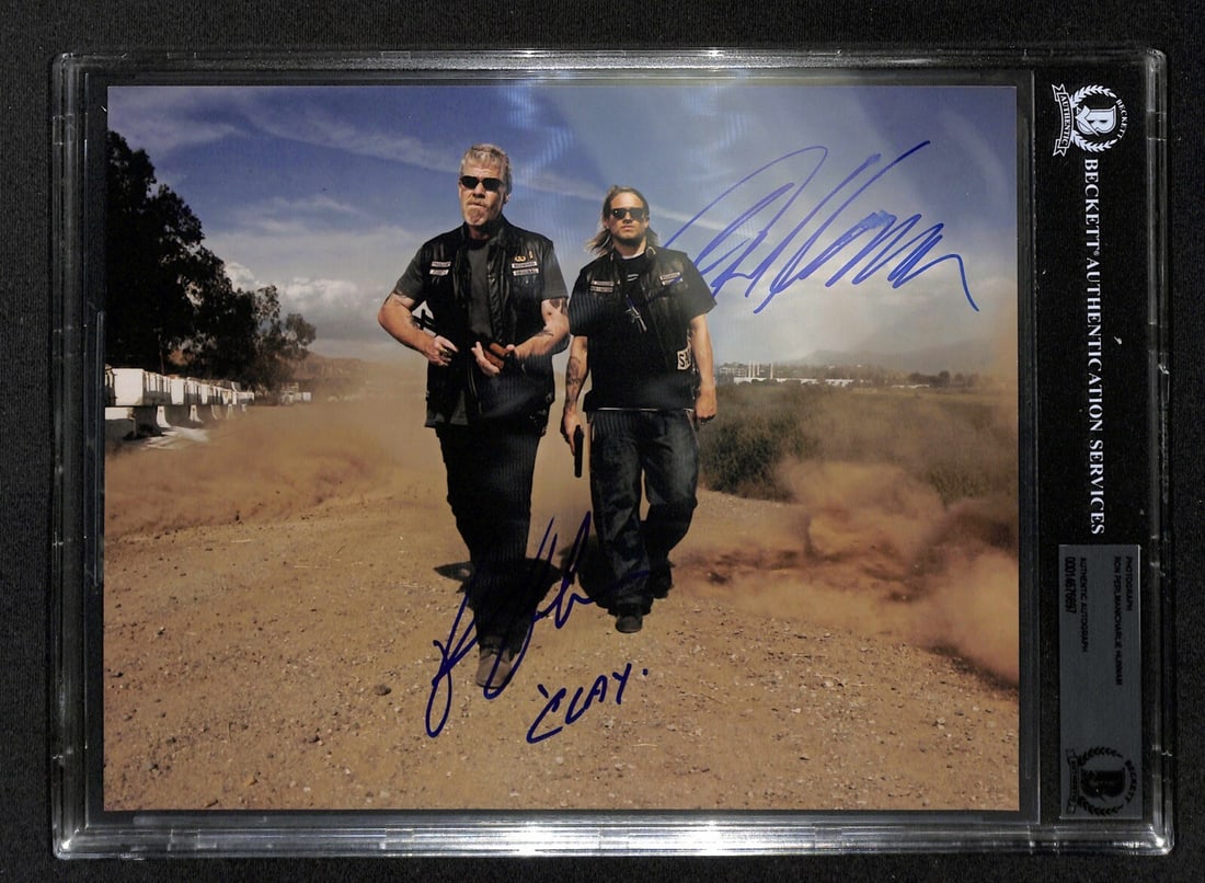 Sons of Anarchy 8x10 Photo Dual Signed by Hunnam and Perlman Beckett Authenticated: Sons of Anarchy 8x10 Photo Dual Signed by Hunnam and Perlman Beckett Authenticated This is an original 8x10 color photograph autographed by Charlie Hunnam (as Jax) and Ron Perlman (as Clay) from the t