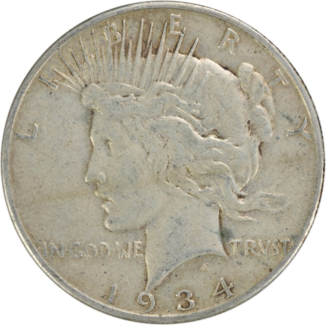 1934-S Peace Silver Dollar 90% Silver VF Uncertified Coin: 1934-S Peace Silver Dollar 90% Silver VF Uncertified Coin This 1934-S Peace Silver Dollar is a beautiful representation of American coinage, featuring a striking design by Anthony de Francisci. With a