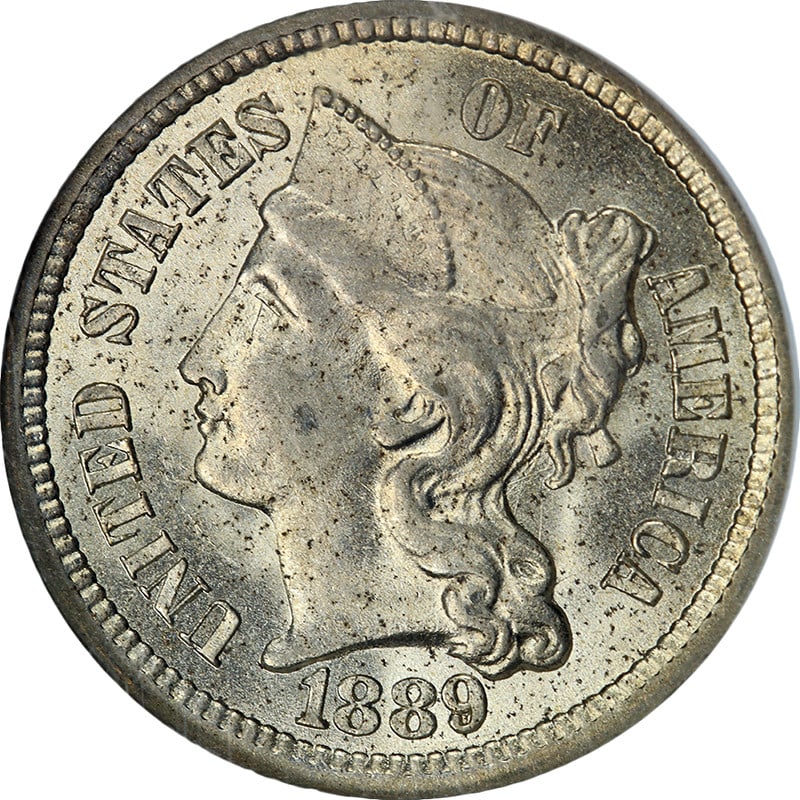 NGC MS63 1889 Three Cent Nickel Uncirculated Coin: NGC MS63 1889 Three Cent Nickel Uncirculated Coin This 1889 Three Cent Nickel coin is certified by NGC with a grade of MS63. The coin is uncirculated and features attractive luster, a well-defined str