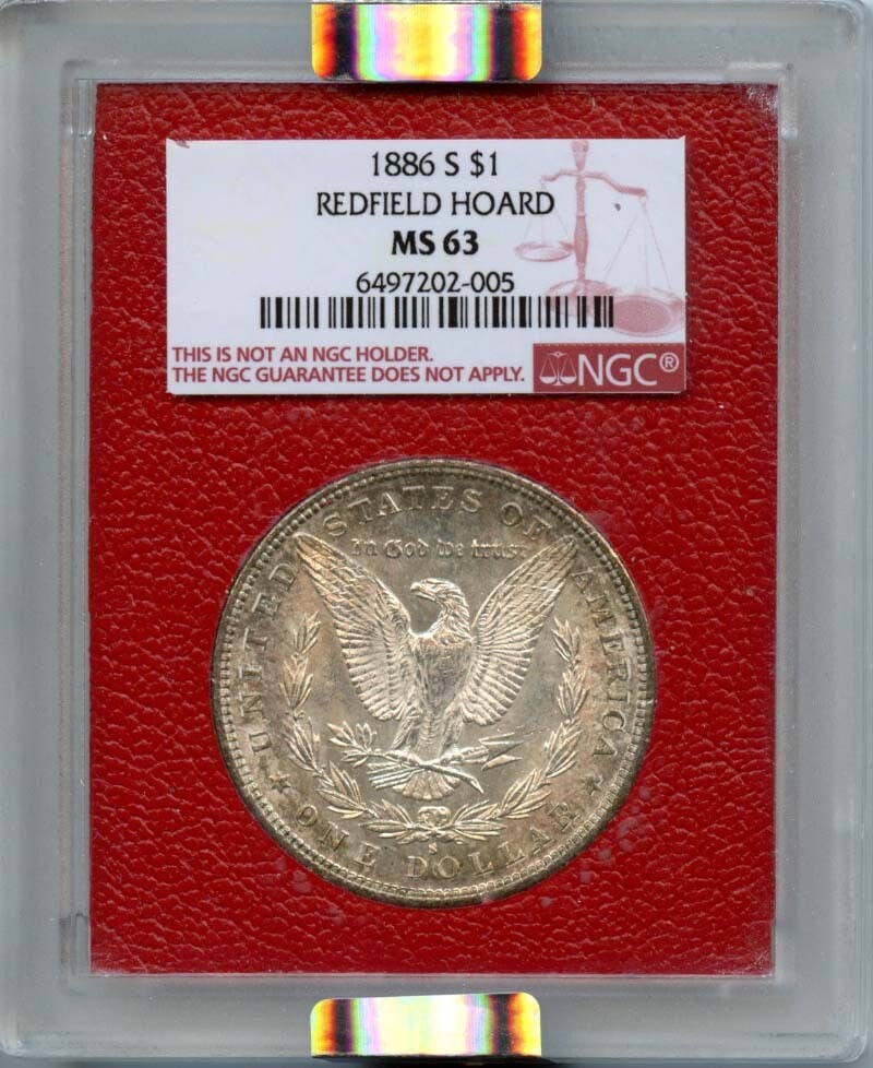 1886-S Morgan Dollar NGC MS63 Redfield Hoard Uncirculated: 1886-S Morgan Dollar NGC MS63 Redfield Hoard Uncirculated This 1886-S Morgan Dollar is a stunning piece from the Redfield Hoard, certified by NGC with a grade of MS63, indicating its uncirculated cond