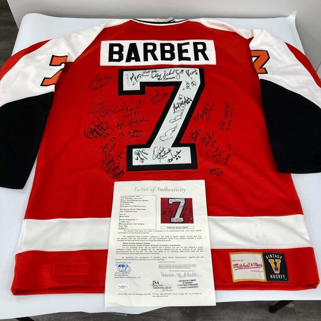1974-75 Philadelphia Flyers Signed Jersey with 24 Autographs JSA COA: 1974-75 Philadelphia Flyers Signed Jersey with 24 Autographs JSA COA Celebrate the legacy of the 1974-75 Philadelphia Flyers with this authentic team-signed jersey, commemorating their Stanley Cup Cha
