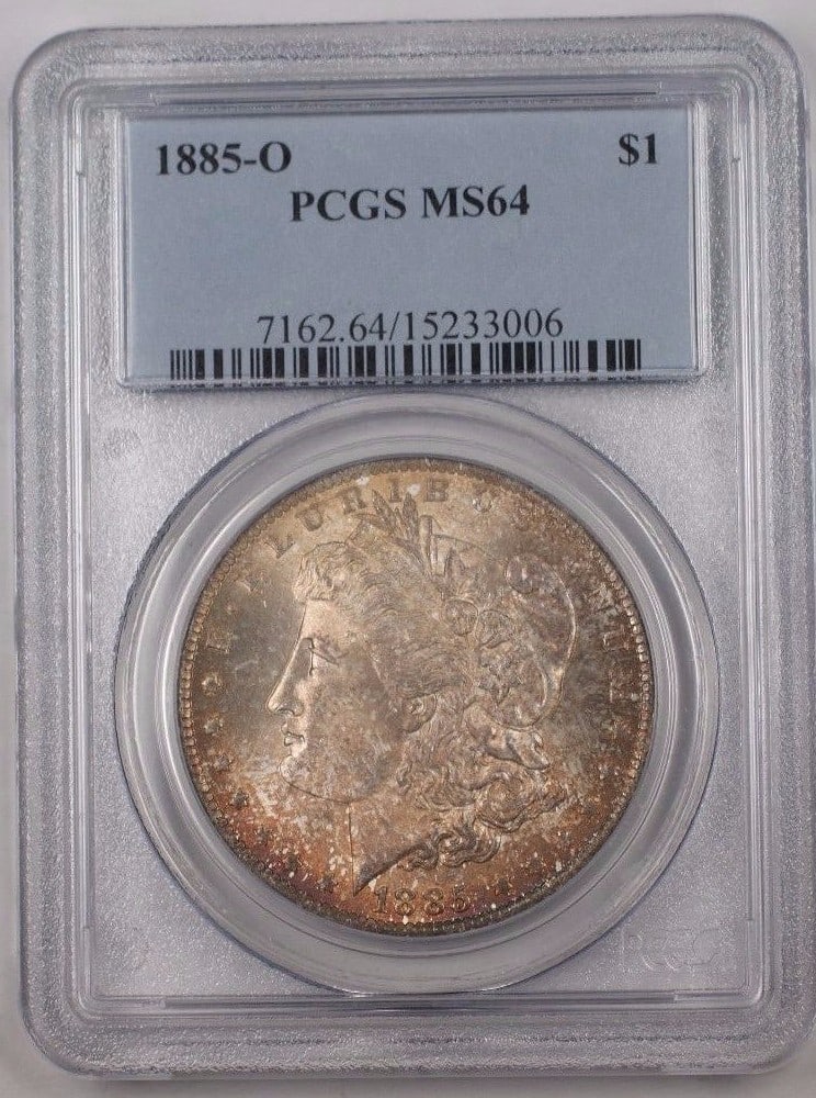 PCGS MS64 1885-O Morgan Silver Dollar New Orleans Mint Uncirculated Toned: PCGS MS64 1885-O Morgan Silver Dollar New Orleans Mint Uncirculated Toned This 1885-O US Morgan Silver Dollar is a beautifully toned coin graded MS-64 by PCGS. Minted in New Orleans, it features an un