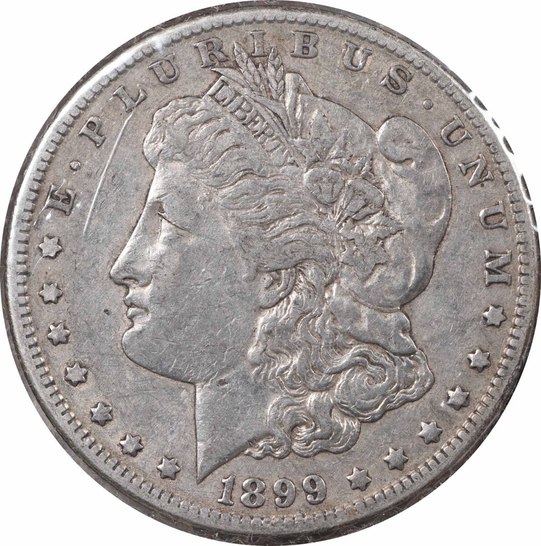 1899 Morgan Dollar VAM 31 Micro O Extra Fine Uncertified Silver Coin: 1899 Morgan Dollar VAM 31 Micro O Extra Fine Uncertified Silver Coin This 1899 Morgan Silver Dollar features the VAM 31 Micro O variety and is in Extra Fine (XF) condition. Struck at the New Orleans M