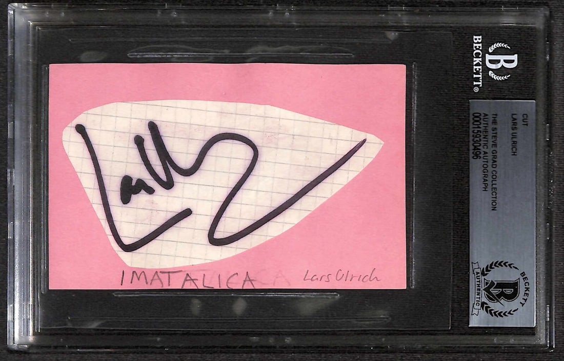 Beckett Certified Lars Ulrich Autograph Cut from Metallica 1985: Beckett Certified Lars Ulrich Autograph Cut from Metallica 1985 This autographed cut features the full name signature of Lars Ulrich, co-founder and drummer of Metallica, signed in black permanent mar
